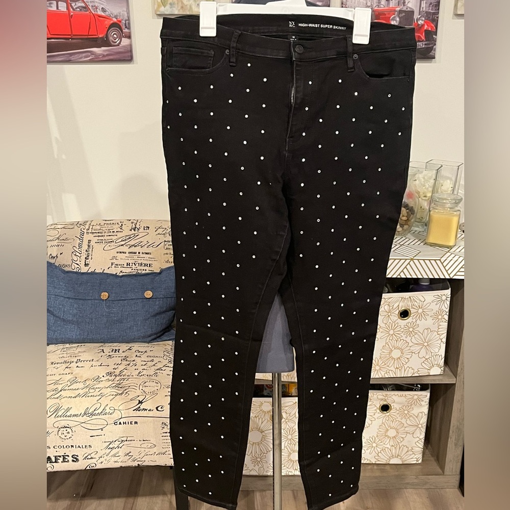 Black jeans with rhinestone details on front